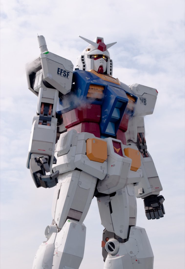 The full-size white Gundam robot statue at Odaiba, photographed from below.